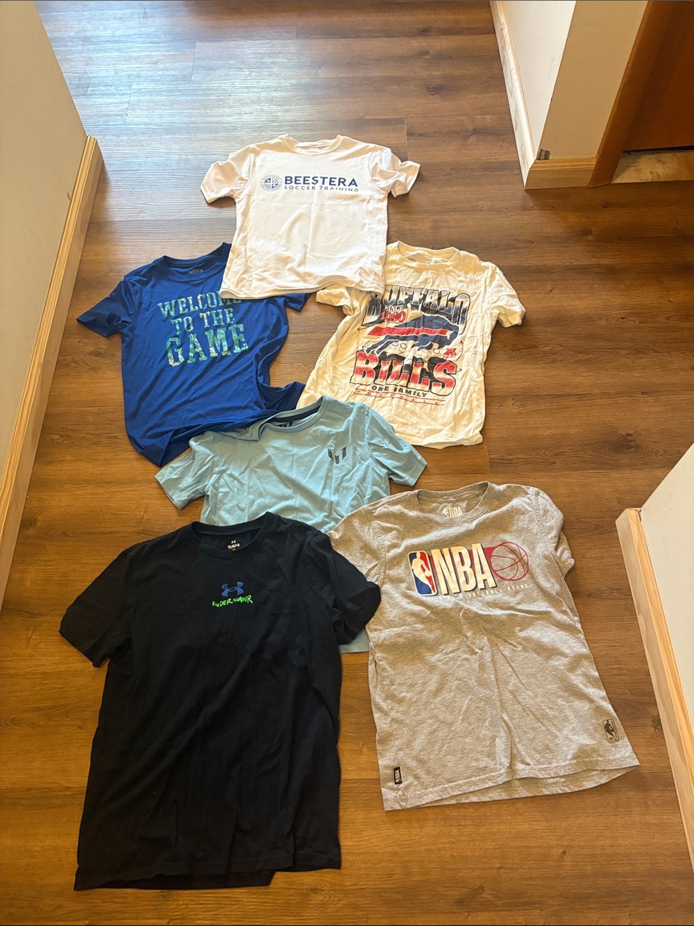 Boys t-shirts size 10-12/ large with sports logos